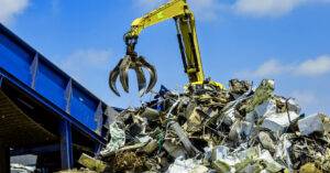 Scrap metal yard machine, representing the sale of a scrap metals company facilitated by BMI Mergers & Acquisitions.